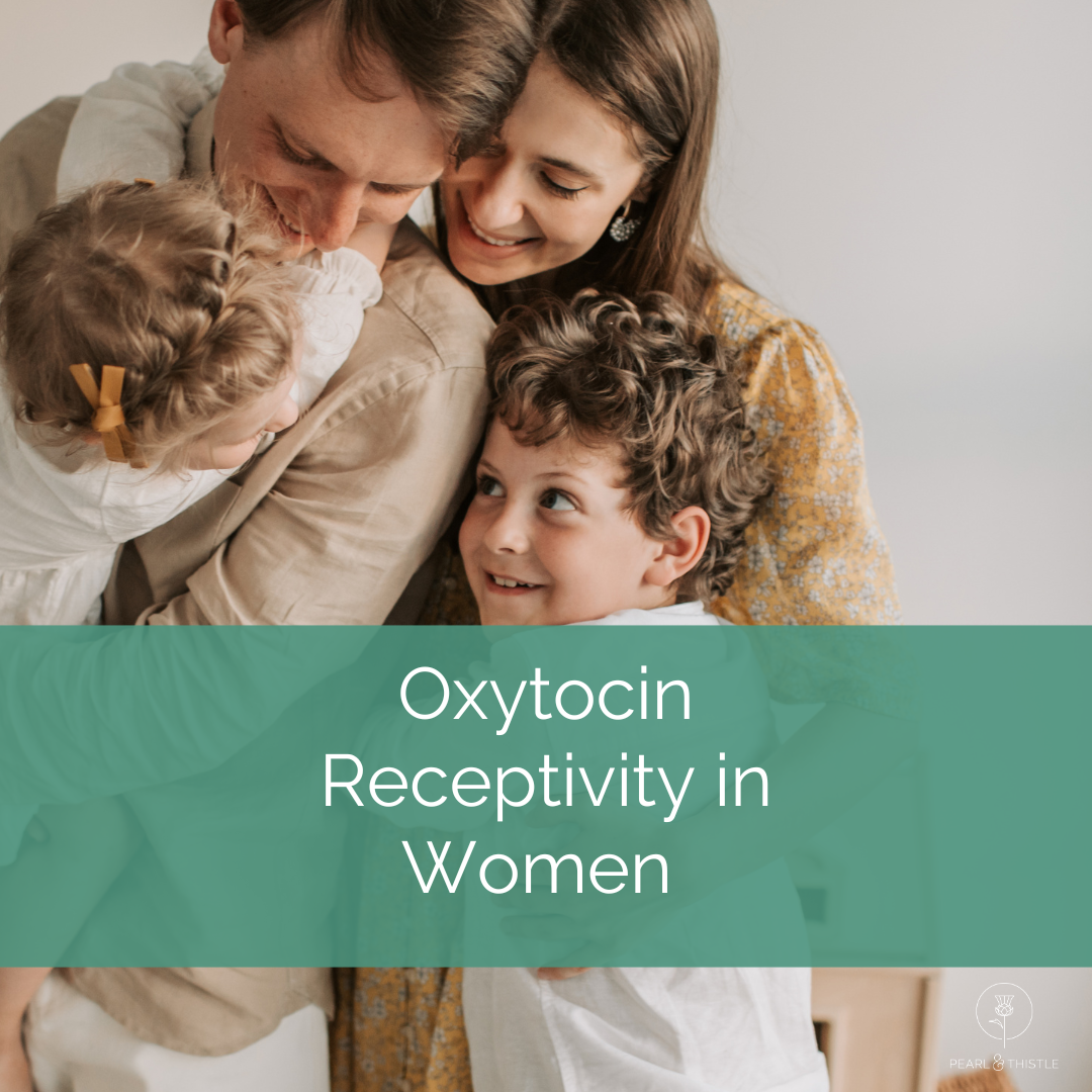 woman hugs her husband and children. text reads "oxytocin receptivity in women"